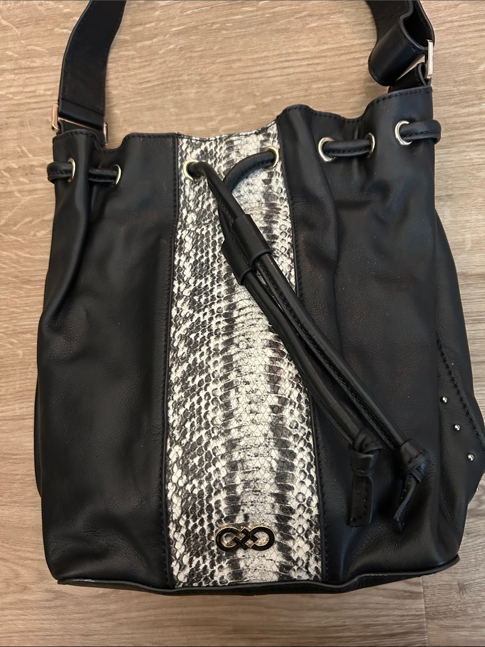 Cole Haan Medium Black Leather Crossbody Bucket Bag with Snake-Print Panel